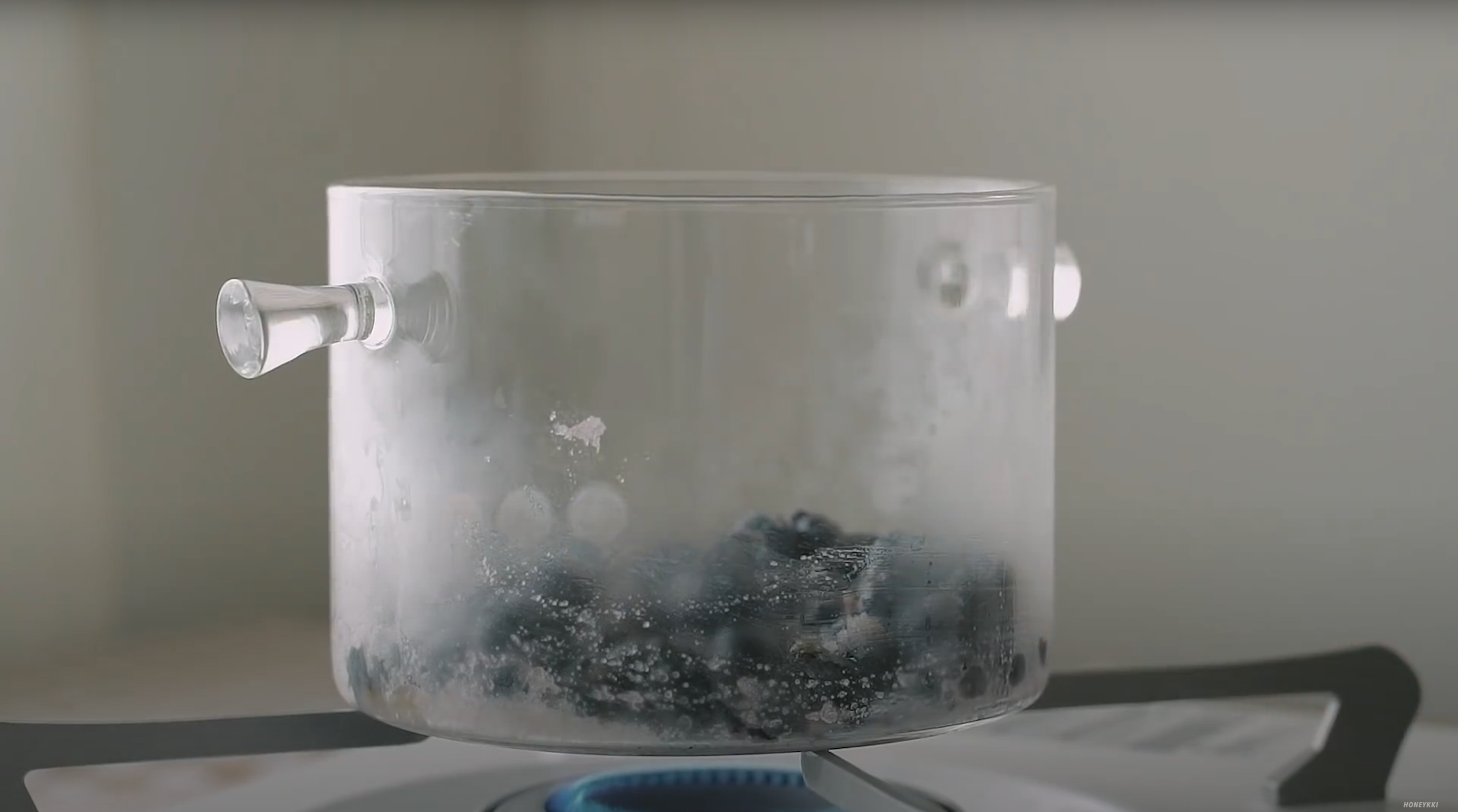 image of blueberries and sugar in a pot